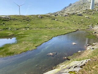 Summer atmosphere on the Lago di San Carlo lake (Lake San Carlo) in the Swiss alpine area of the mountain St. Gotthard Pass (Gotthardpass), Airolo - Canton of Ticino (Tessin), Switzerland (Schweiz)