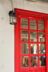 Fototapeta premium a red door,the entrance to a store