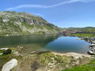Fototapeta na wymiar Summer atmosphere on the Lago della Piazza lake (Lake of the Piazza) in the Swiss alpine area of the mountain St. Gotthard Pass (Gotthardpass), Airolo - Canton of Ticino (Tessin), Switzerland (Schweiz