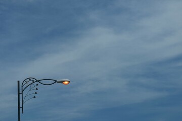 street lamp on blue sky