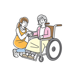 車椅子に乗るシニア女性と介護スタッフ