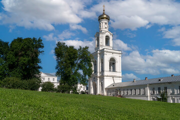 Fototapeta na wymiar View of the belfry of St. George (Yuryev) Monastery on a sunny summer day, Veliky Novgorod, Russia