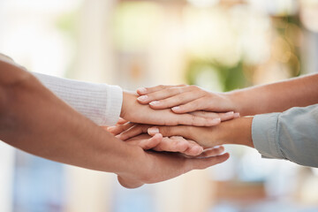Hands, teamwork and support with a business group together in a huddle or circle in solidarity...