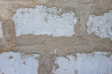 Gray brick wall background outside of the building.