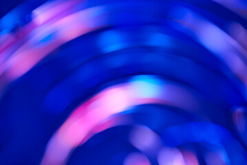 Abstract blue and pink blur background, dynamic flowing lights, motion design in fluid spining...