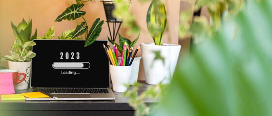 Waiting for new year.  Loading year 2022 to 2023 for start new business and new life.  Nature background in garden. Copy space for banner