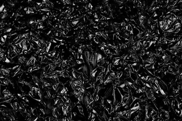 black crumpled paper abstract background texture