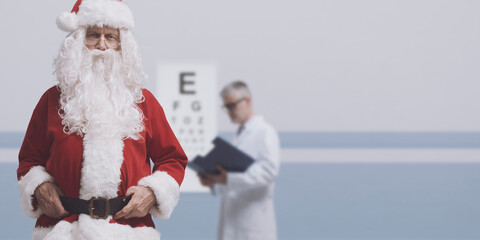 Santa Claus having a professional eye exam