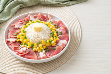 fresh pork raw sliced with rice and corn on plate and ready to cook