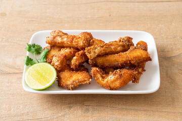 Fried Snapper Belly on white plate
