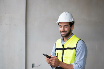 Happy man using mobile phone. caucasian man with smart phone. Young businessman on the way to the office searching information on the internet with smartphone. Business, education, lifestyle concept.