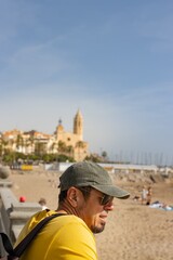 Colombian man on vacation in Sitges (Spain), travel concept.