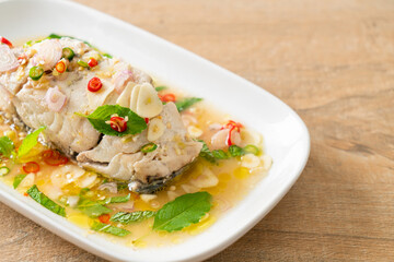 steamed sea bass fish with herbs