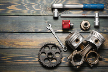 Car spare parts on the workbench flat lay background with copy space. Car repair service.