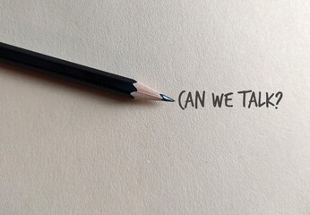Pencil on copy space craft paper with text written CAN WE TALK?, concept of boss , manager,...