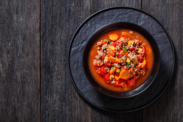 Hamburger Soup with barley and vegetables in bowl