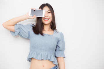 Beautiful asian woman wear jean smiling on white background