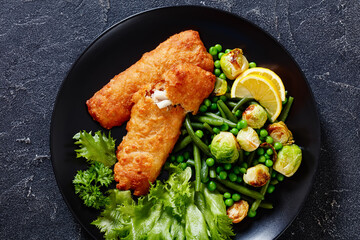 Crispy Beer Batter Cod Fish with green  vegetables
