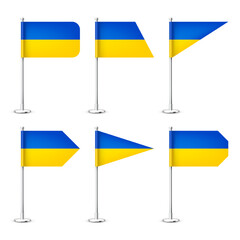 Realistic various Ukrainian table flags on a chrome steel pole. Souvenir from Ukraine. Desk flag made of paper or fabric, shiny metal stand. Mockup for promotion and advertising. Vector illustration