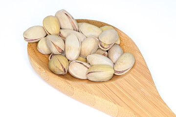 pistachios ready to eat on white background