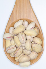 pistachios ready to eat on white background