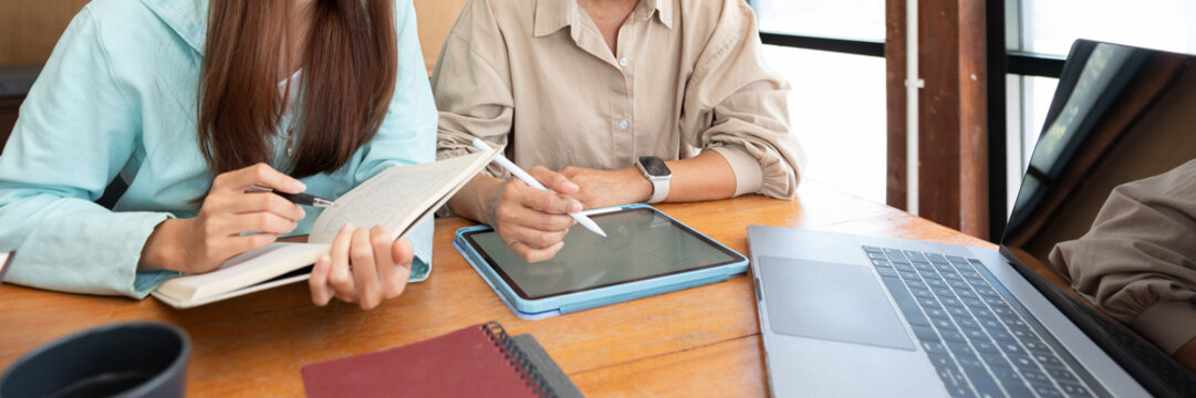 College education concept, Female tutor writing on tablet to tutoring lessons for teenage girl