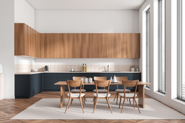 Modern kitchen interior with eating table and chairs, kitchenware and window