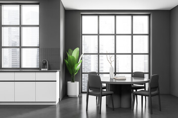 Front view on dark kitchen room interior with panoramic window