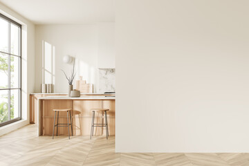 Light kitchen interior with bar countertop and cooking area, window. Empty wall