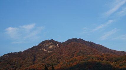 Fototapeta premium Yongmunsan Mountain in Yangpyeong, Gyeonggi-do. hiking in Korea. Korean mountains in autumn - Maple