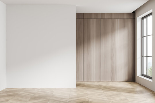 Stylish empty room interior and panoramic window on countryside. Mockup wall