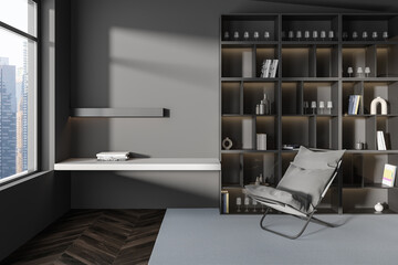 Grey relaxing interior with armchair and shelf with decor, panoramic window