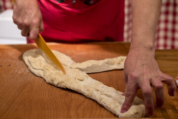 Process of baking chimney cake in a Christmas market