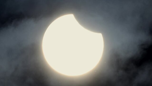 8k Amazing realtime raw footage of natural phenomenon solar eclipse across clouds and wind. Real video filmed on telescope with nikon Z9 high quality 8k camera