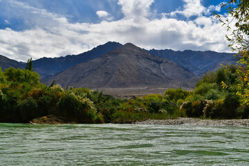 Sangam is the point where the rivers Indus and Zanskar join together - the green hues of Indus clashing with the muddy blue stream of Zanskar

Magnet Hill is a gravity hill located near Leh in Ladakh.