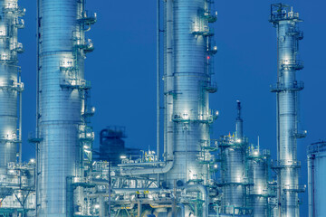 Illuminated refinery factory at night