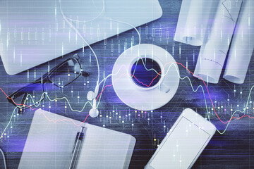 Multi exposure of forex graph drawing over desktop background with computer. Concept of financial analysis. Top view.