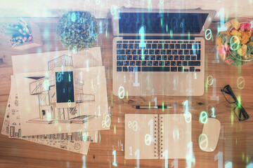 Double exposure of data theme drawing hologram over topview work table background with computer. Concept of technology.