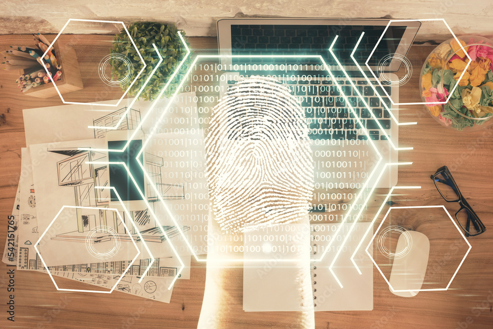 Aufkleber Finger print over computer on the desktop background. Top view. Double exposure. Concept of securitization.