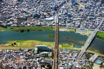 狛江市上空から登戸駅方向を空撮