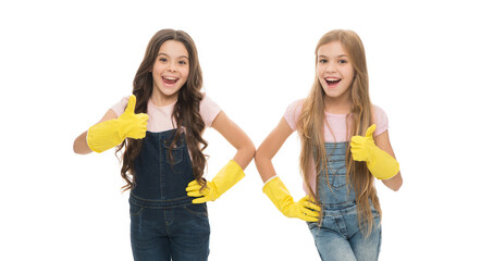 Thumbs up for the work around the house. Happy small cleaners enjoy doing cleaning work. Little girls performing house work. All kinds of cleaning work