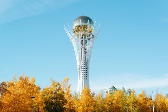 Baiterek monument with a golden ball observation platform against the blue sky on a sunny autumn day. Kazakhstan, Astana 14.10.2022