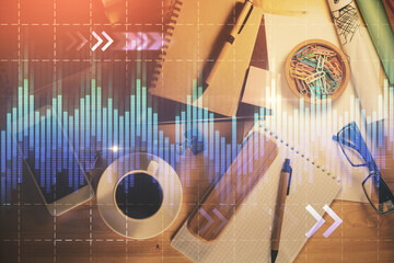 Double exposure of forex graph drawing and work table top veiw. Concept of financial analysis.