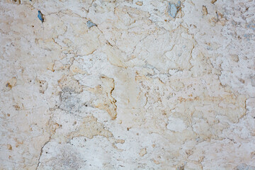 Old whitewashed wall with rich texture