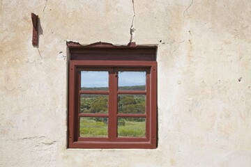 old window in the old wall