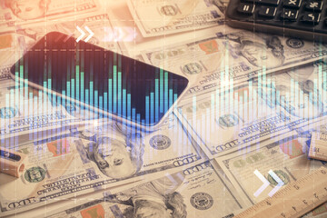 Double exposure of forex graph drawing over us dollars bill background. Concept of financial markets.