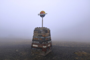 the Midnight Sun Monument at Nordkapp North Cape on a foggy day