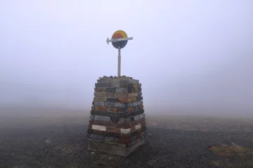 Foto auf Acrylglas the Midnight Sun Monument at Nordkapp North Cape on a foggy day © Dynamoland