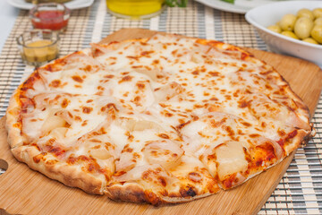 pizza on a wooden board