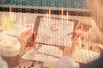 Double exposure of man's hands holding and using a phone and financial chart drawing. Market analysis concept.